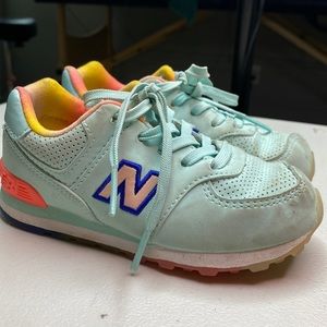 Rainbow colored new balance tennis shoes for toddlers size 9